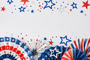 Obraz premium Party concept for celebrating American Independence Day. Top view flat lay of patriotic paper decorations, star-shaped confetti on white background with empty space for message or text