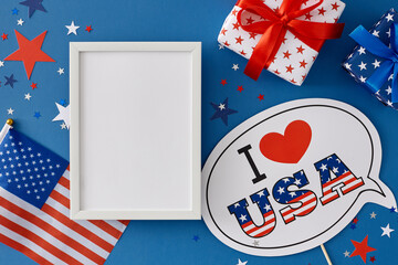 Obraz premium Idea for a Fourth of July celebration party. Top view flat lay of gift boxes, Independence Day supplies, star-shaped confetti on blue background with blank frame for greetings or ad