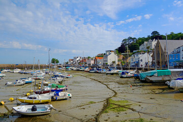 Fototapeta na wymiar The picturesque resort of St Aubin's Jersey in the pretty Channel Islands with colourful boats. in the Harbour U.k.