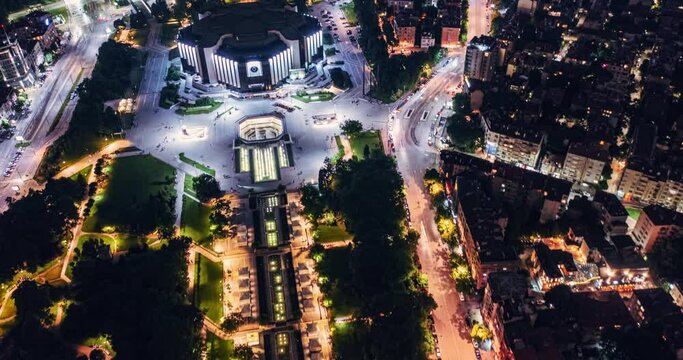 Drone night hyperlapse of the downtown streets of Sofia's and National Palace of Culture. Capital of Bulgaria, Travel to Bulgaria