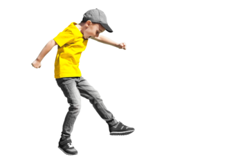 a boy jumps on a transparent background in a yellow t-shirt