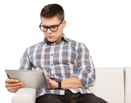 handsome man surfing on digital tablet on a couch
