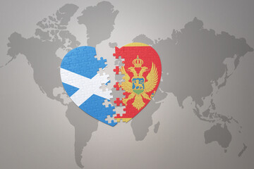 puzzle heart with the national flag of montenegro and scotland on a world map background.Concept.