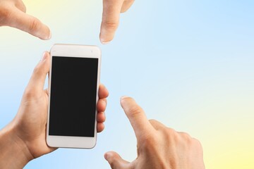 Human holding smartphone with white blank screen