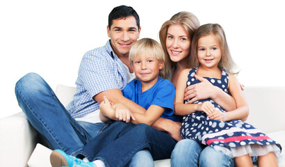 lovely young family sitting at home