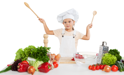 little cute chef holding wooden spoon with different pair of gloves looking at camera and smiling on gray background