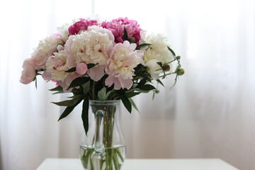 bouquet of pink and white peonies