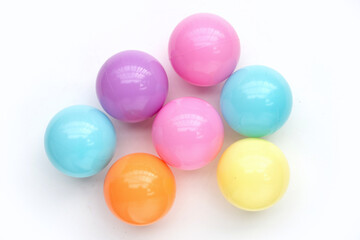 Colorful balls on white background.