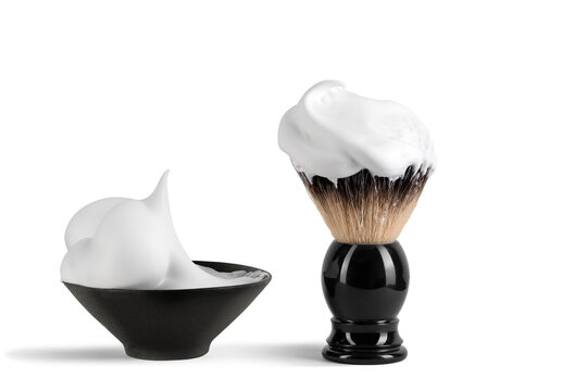 Shaving brush and shaving foam isolated on a white background