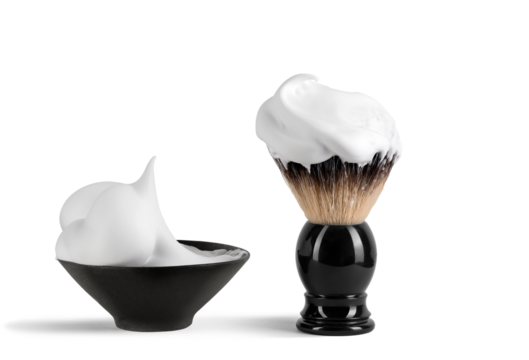 Shaving brush and shaving foam isolated on a white background