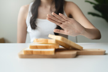 person avoid to eating white bread for her health.