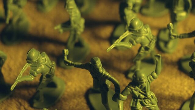 Toy soldiers stand strong in formation on battlefield. Violence war resistance and peace without armored invasion