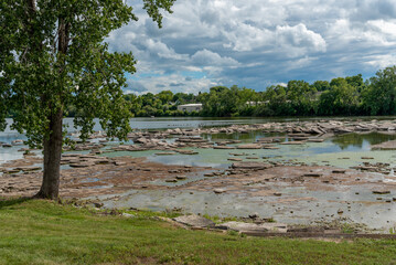 Fototapeta na wymiar The Fox River As Seen At Little Chute Lock And Dam At Island Park, Little Chute, Wisconsin