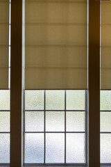 Interior view of art deco grand windows with blinds