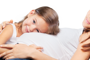 Happy child holding belly of the pregnant mother