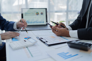 Businessman discussing commercial real estate sector faces risks as financial.	