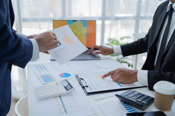 Businessman discussing commercial real estate sector faces risks as financial.	