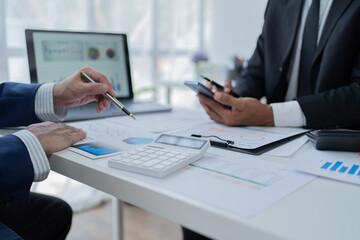 Businessman discussing commercial real estate sector faces risks as financial.	