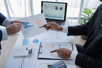 Businessman discussing commercial real estate sector faces risks as financial.	