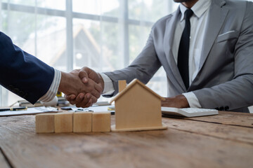 Businessman discussing commercial real estate sector faces risks as financial.