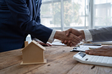 Businessman discussing commercial real estate sector faces risks as financial.