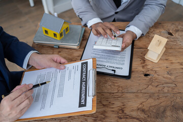 Businessman discussing commercial real estate sector faces risks as financial.