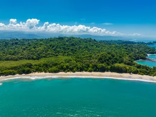 Foto op Canvas Aerial view of Manuel Antonio National Park in Costa Rica. The best Tourist Attraction and Nature Reserve with lots of Wildlife, Tropical Plants and paradisiacal Beaches on the Pacific Coast. © ingusk