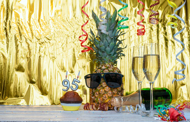 Cheerful pineapple in glasses festive happy birthday character with number  95. Beautiful...