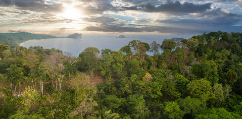View over Wafers Bay Cocos Island Costa Rica. Aerial Drone View of a tropical island with lush...