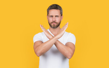 man refuse with denial gesture in studio. photo of denial man show refuse. man refuse and denial.
