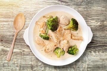 Tasty Chicken stew with vegetables and green herbs.