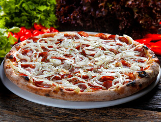 Pepperoni pizza with onion rings