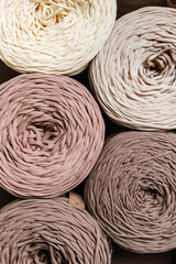 Knitted threads for knitting. beige shades top view