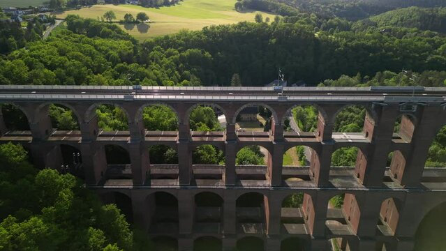Aerial View at sunset of a Brick Bridge and Railway track in Western Germany crossing the Goltzsch Valley. G&ouml;ltzschtalbr&uuml;cke, G&ouml;ltzsch Viaduct