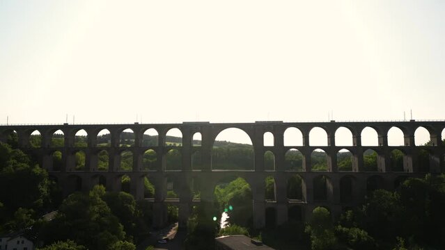 Aerial View at sunset of a Brick Bridge and Railway track in Western Germany crossing the Goltzsch Valley. G&ouml;ltzschtalbr&uuml;cke, G&ouml;ltzsch Viaduct