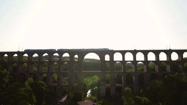 Aerial View at the train on Brick Bridge and Railway track in Western Germany crossing the Goltzsch Valley. G&ouml;ltzschtalbr&uuml;cke, G&ouml;ltzsch Viaduct