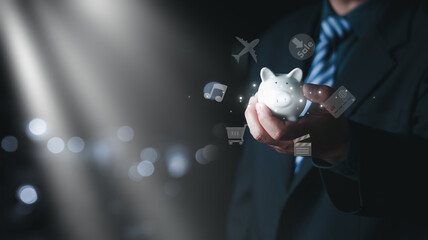 Business concept Close up of man using piggy bank and infographic icon of community technology digital.Concept of hi tech and big data,  Save money concept.