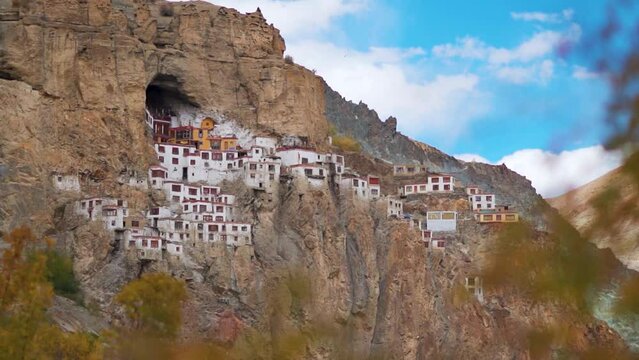 Phugtal Gompa during the autumn season at Zanskar in Ladakh, India. Monastery built on a cave inside the mountains about 2500 years ago. View of monastery inside the mountain in Zanskar at autumn. 