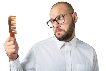 Desperate man with a comb for his baldness
