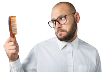 Desperate man with a comb for his baldness