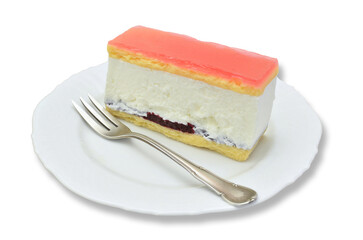 Piece of Cheese fancy cake on white Plate, close up on white background