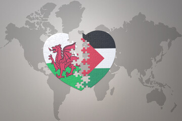 puzzle heart with the national flag of palestine and wales on a world map background.Concept.