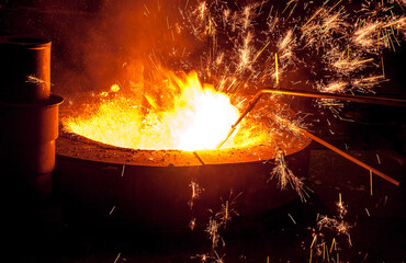 Iron-steel melted in a high temperature furnace. The process, which is carried out under very...