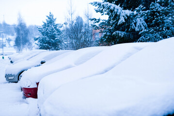 Snowy car in winter city Liptovsky Mikulas with a lot of snow