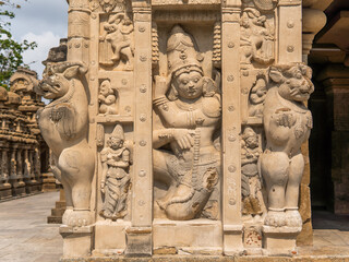 Old sculpture of dwara balakar along with mythological lions at Kailasanatha temple, Kanchipuram (Kancheepuram Kanjivaram), Tamil-Nadu, India.