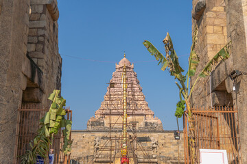 Gangaikonda Cholapuram temple vimanam which houses the siva lingam with blue sky in the background,...