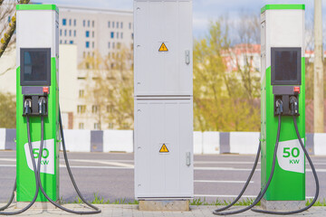 Green electric charging stations with grey power transformation station