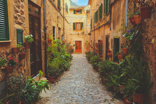 Fototapeta Valldemossa typical village with plants pots in facades at Mallorca island, Spain