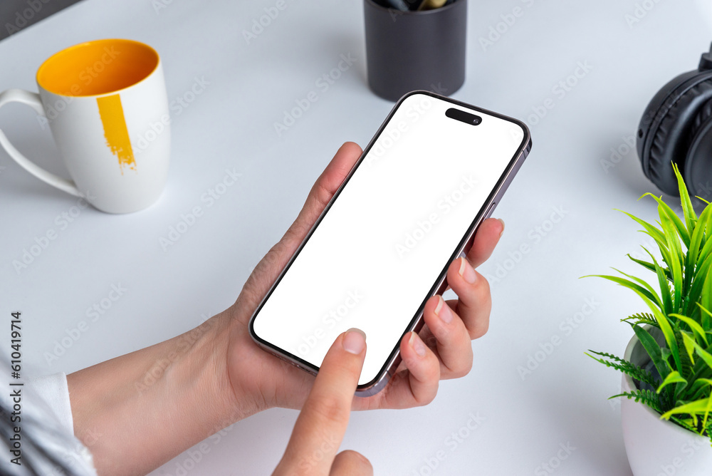 Poster smartphone mockup. women hand using mobile phone. white screen isolated for app presentation. office
