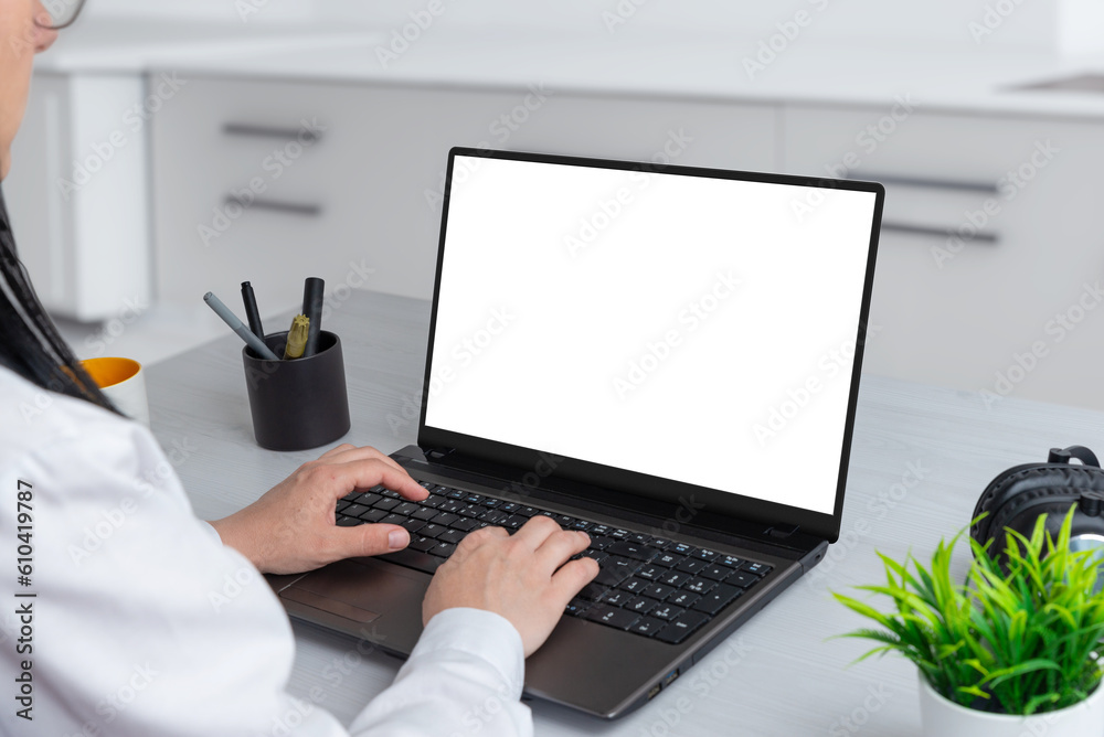 Poster laptop computer mockup. woman work on laptop in office. business composition. isolated screen for we